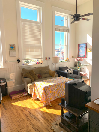 Living Room/Kitchen - Off-Campus 2 Bedroom 2 Bath Apartment. 5 minute drive to campus.