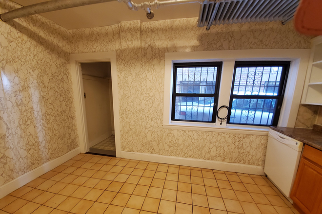 Kitchen & Entrance to Pantry - 1-2 Bedroom Basement Apt close to Main campus