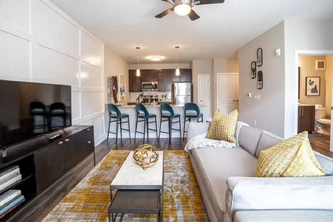 Living room - Looking for a third roommate! The Century at Purdue Research Park (Females Only)