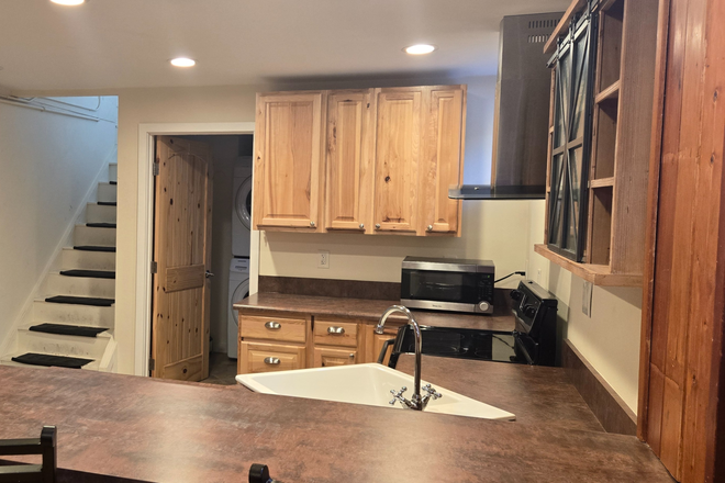 Kitchen with breakfast bar - DU Neighborhood | Spacious 1,000 Sq Ft Basement Apartment w/ Private Entrance | Utilities included.