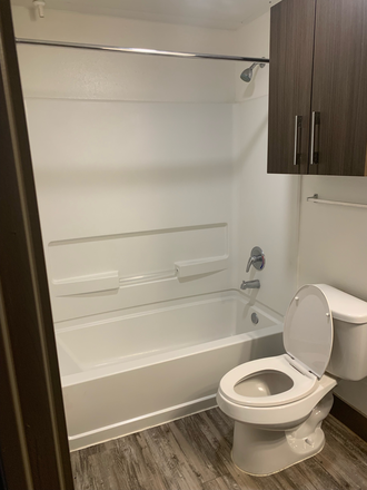 Bathroom, shower and toilet - Holleman Crossing Apartments, close to campus