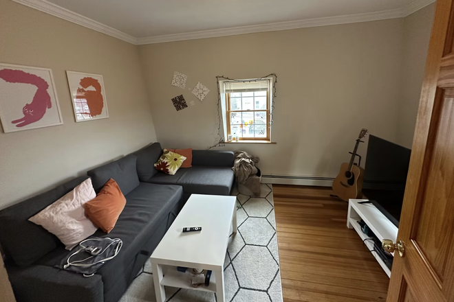 Living room - Spacious 3-Bedroom Apartment with Modern Amenities