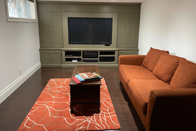 furnished living room - Large basement apartment
