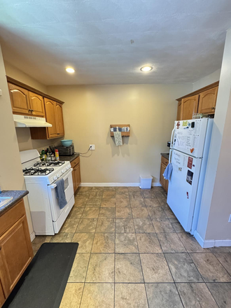 Spacious kitchen with plenty of storage - TWO ROOMS AVAILABLE. NO BROKER FEE! PARKING INCLUDED. Duplex