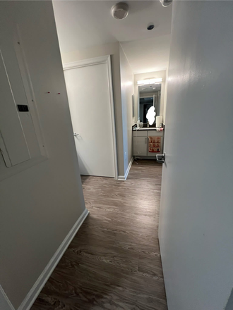 Hallway separating both bedrooms from living room. - University View Sublet Apartments