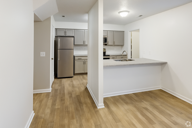 Kitchen and access to the laundry room to the right hand side. - 3 Bed 1.5 Bath Townhome
