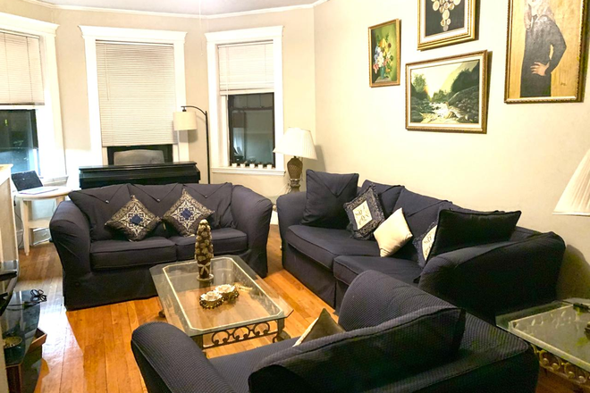 Living Room with Sony Digital TV , Roland Electrical Organ, Imported Sofa Set with Display Unit - Semi-furnished 2-bedroom condo furnished living, dining , kitchen. Tenant supplies beds, mat