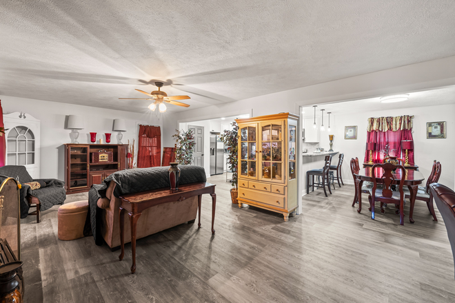 Open-concept living, dining, and kitchen area! Bright, spacious, and perfect for hosting. A seamless layout at 102 Adams Dr. View today! - Private Furnished Room Minutes from Liberty University House