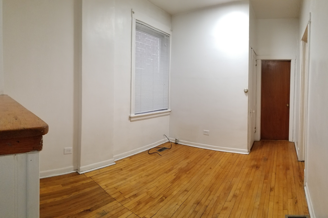 Living Room - Taylor and May,  3 Blocks from UIC Campus,  2nd Floor. rear 2 Bedroom, 1 Bathroom Apt.  Hardwood flo