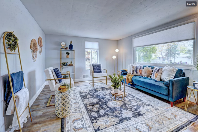 Living Room area - 3-bedroom house, just north of Campus. Off-street parking.