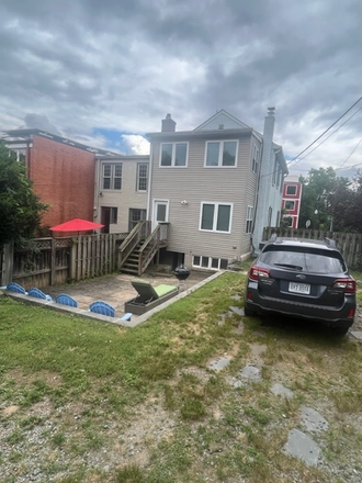 Rear Exterior - 6 Bedroom End Unit W/6 Car Pkg. Available 6/1/27 House