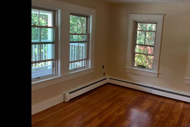 LR -partial - Convenient to UMass but quiet & less expensive, 2 bdrm filled w/ sunlight, natural beauty, 2 porches Duplex
