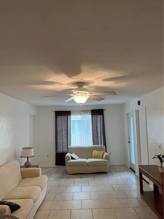 Living room - Apartment within 2 miles to UF campus University Terrace West