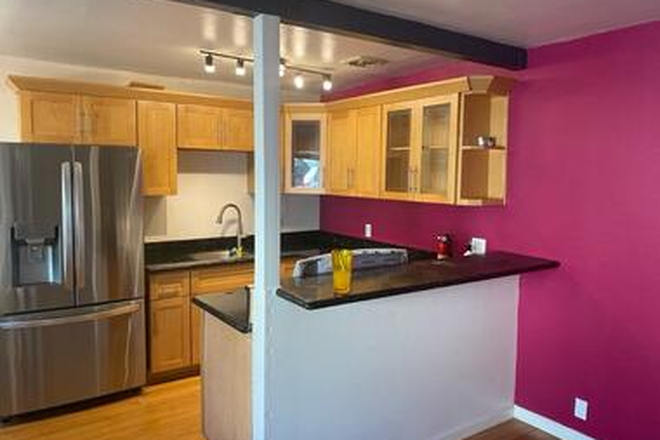 Kitchen: Refrigerator, stove, lots of cabinet room - Apartment on Jefferson Ave