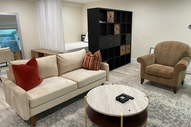 Comfy living area - Spacious, Modern, Furnished 1 BR/Studio next to BC  (includes all utilities) House