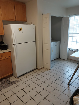 Kitchen and laundry area - Fully furnished 1 bedroom with private bathroom Townhome