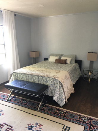 bedroom - Freshly painted studio with ample storage, garden views. Walk to transit, 15 min drive to campus.