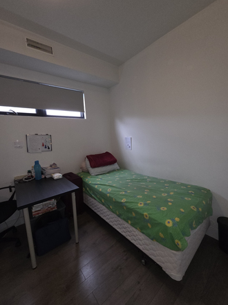 Bedroom 1 - 2 Furnished Bedroom in a 3-Bedroom Apartment include Laundry (dryer & washer) and Furnished Kitchen