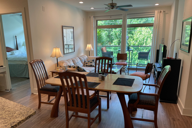 Common Area/Living Room looking out to Balcony area - One Bedroom and Bathroom in 2 Bedroom / 2 Bath Apartment