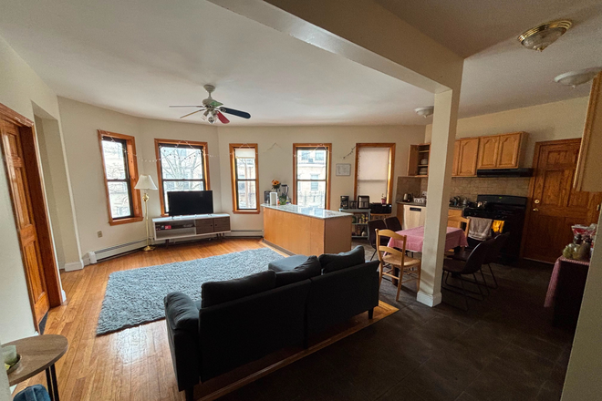 Living room + open kitchen - Furnished 5 bed/2 bath Brighton apartment, looking for 2 more roommates!