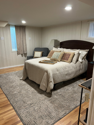 Bedroom with furnishings included - 1 bedroom furnished basement apartment in house