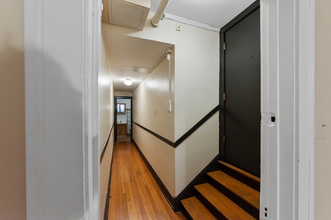 Front door and interior hallway - Two Bedroom Units available Apartments
