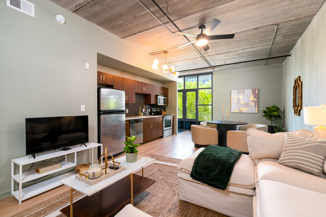 Living room - Elegantly Designed | Prime Downtown Location | Walk to All the Hotspots Apartments