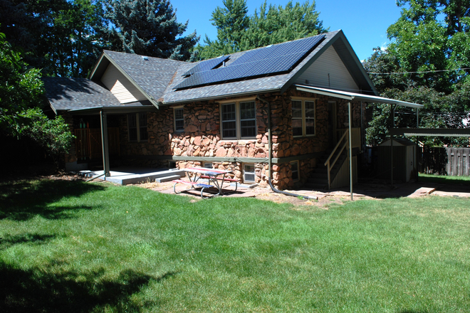 Backyard showing house, carport, etc - University Hill Duplex | Two 2BR Units Available | All Utilities Included