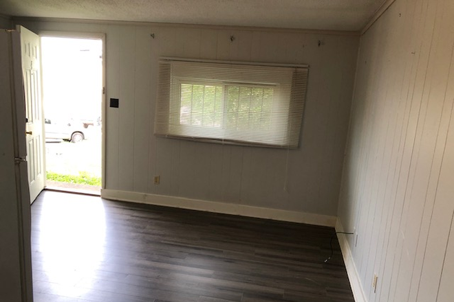 living room - One-bedroom apartment in the Fort Sanders area  living room, kitchen, full bath, and private parking