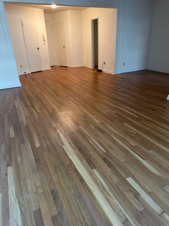 Livingroom looking towards entrance - Huge Bright Studio Apartment with Private dressing room and Full Bath