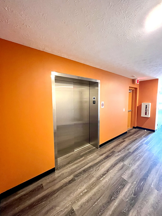Elevator Access - Cypress (117 E Columbia St) Apartments