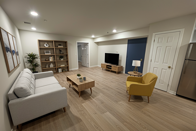 Living Room (Note: Staged photos are digitally rendered and intended to illustrate how the unit may look furnished.) - 1204 Chestnut Apartments