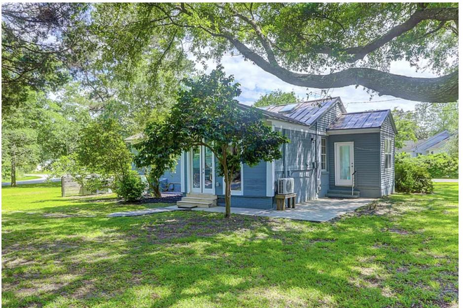 Back of the house - Stylish home, freshly painted with new AC, walk to Whole Foods & Harris Teeter, large private lot.