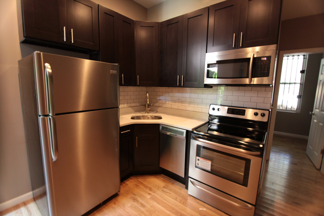 Kitchen - OCP - Newly Renovated With Private Patio - 4 Bed 3 Bath Apartments