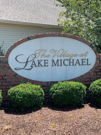 Neighborhood Entrance - Warm and Welcoming Townhome Community in Mebane.  3 miles from 85/40 - 27 miles from campus
