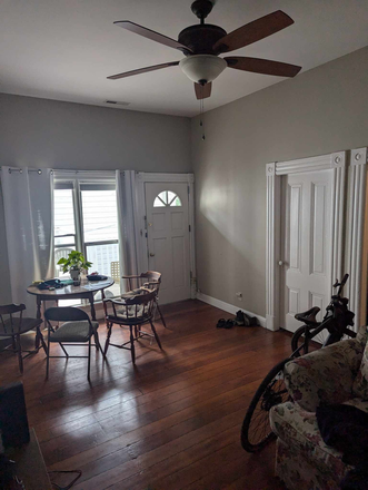 Dining table from living room - 2br/1ba Partially Furnished Downtown Apartment - $2595/mo. High Ceilings, Lots of Light