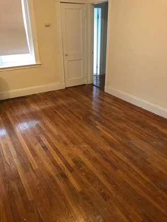 Visit hubrealtyproperties.com - Large corner unit, 1 bedroom with lots of sunlight and front view Apartments