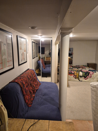 living area - Furnished basement bachelor close to Bathurst subway with laundry