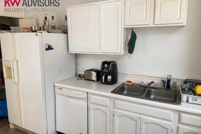 Kitchen - Charming 4 Bedroom Home Steps to Campus| Free laundry| Parking Included!