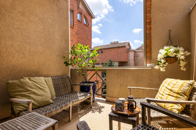 2nd Floor balcony overlooking courtyard - Midtown Lighthouse - Executive furnished, flexible-term Condo - half mile to Emory Hospital