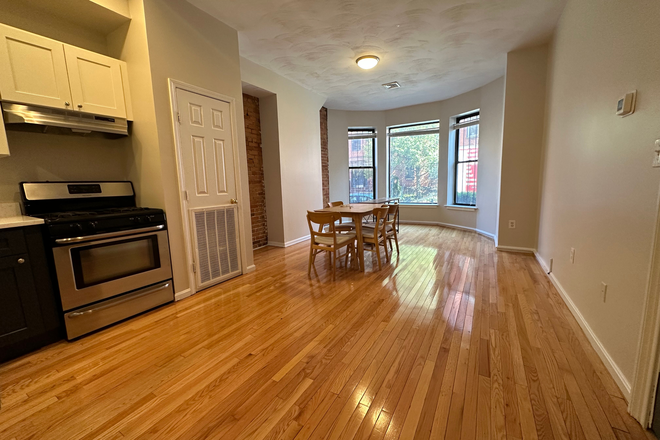 1 - Renovated 2 bedroom on Symphony Road with private deck, high ceilings, exposed brick, central air