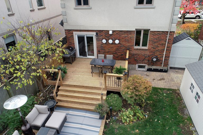 Backyard - 2-bed lower level apartment. New, laundry. Close to St. George, UTSC, transit, shops