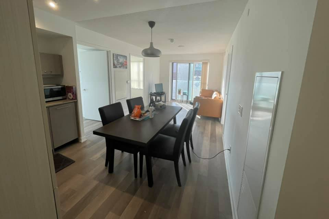 Living/Dining - Stylish 3-Bedroom Condo - Minutes to UofT St. George