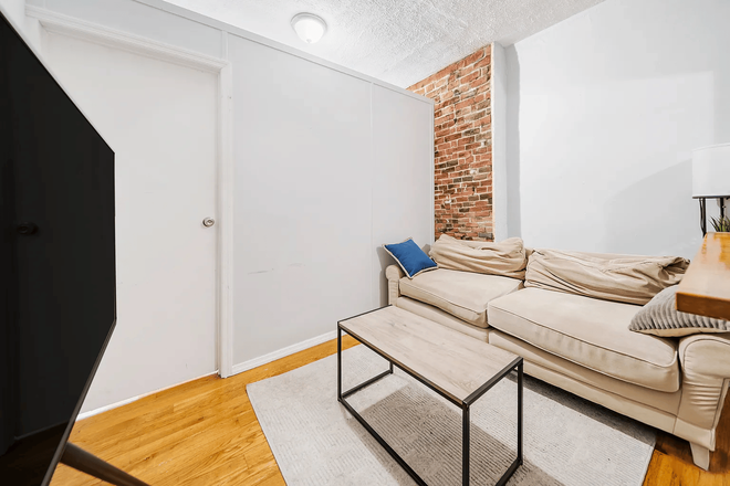 Living Room - Private Room in Hudson Yards/Midtown West — $1,550 — No Broker Fee Apartments