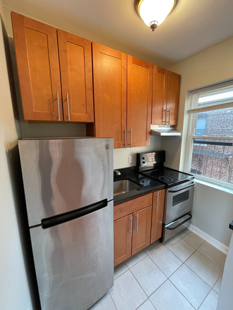 living - LOCATION!! SPACIOUS STUDIO WITH HEAT/HOT WATER INCLUDED, NO BROKER FEE! 9/1/26!