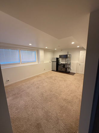 Private Living Room Area - Basement Unit For Rent- All Utilities included Condo