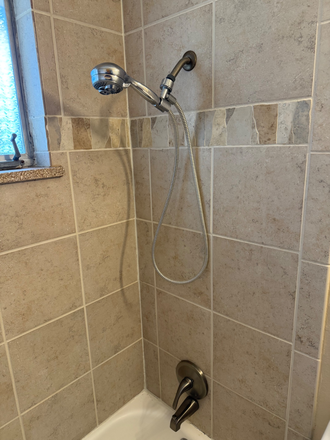 Bathroom shower - Sunny and Bright 3 Bedroom House