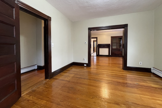 living/dining room - HUGE 2 bed / 1 Bath with laundry in unit and parking! Available NOW!!! Apartments