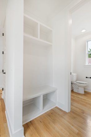 Convenient Drop Zone from the garage and half bath - Brand New and Spacious Home