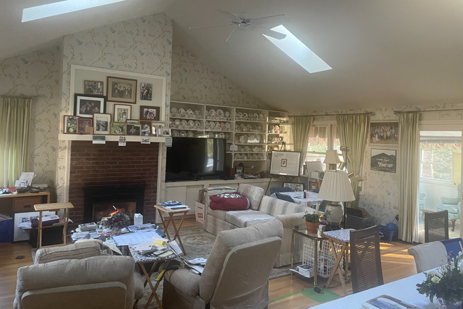 Family room with Skylights - 1 Large & 1 small bedroom available, $ 1000-$1,100 room includes-heat water, elect